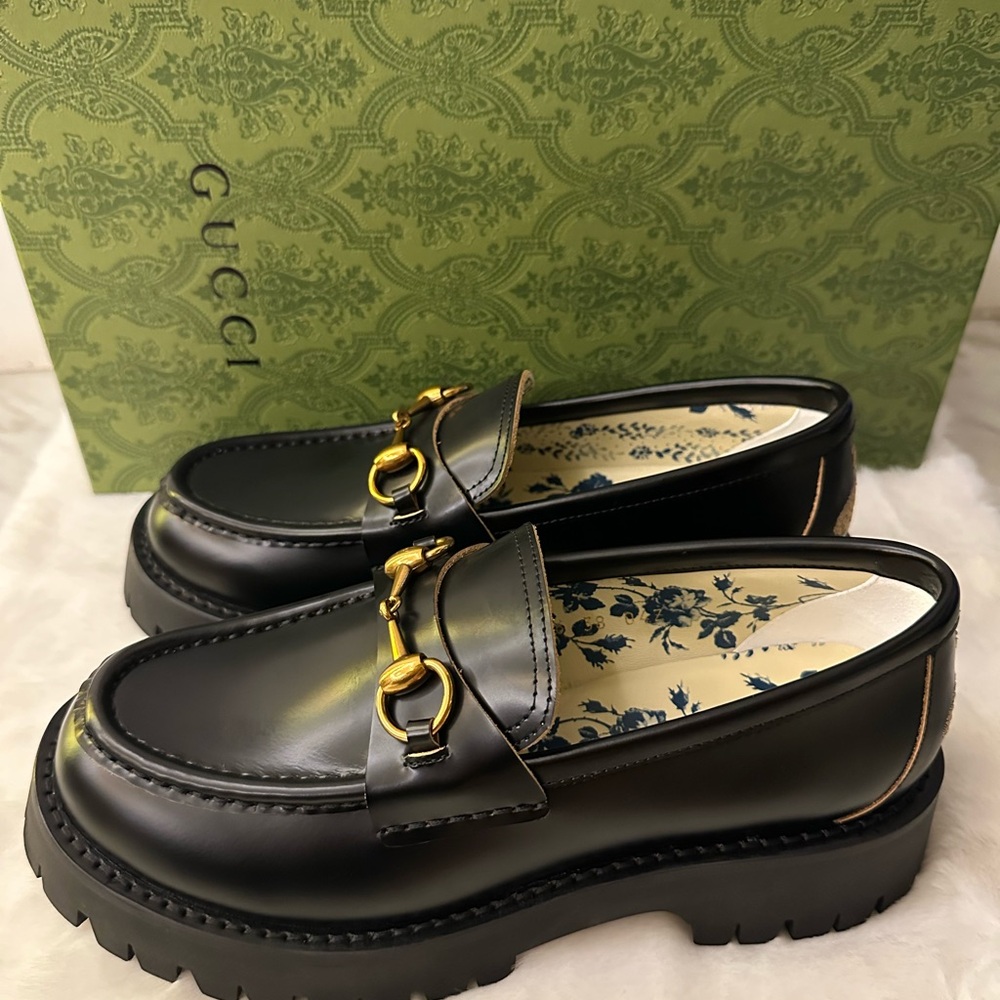 Gucci Black Loafers with Gold Hardware